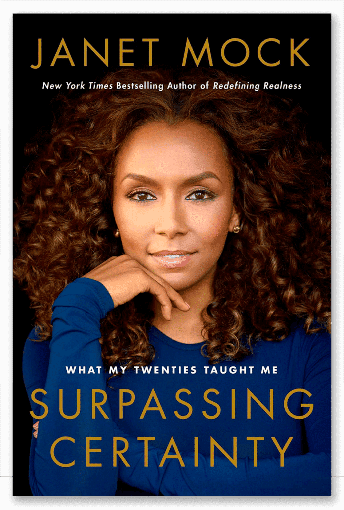 Book cover of “Surpassing Certainty” by Janet Mock, showing a woman with curly hair resting her chin on her hand and looking confidently at the camera. Text reads: “What my twenties taught me.”.