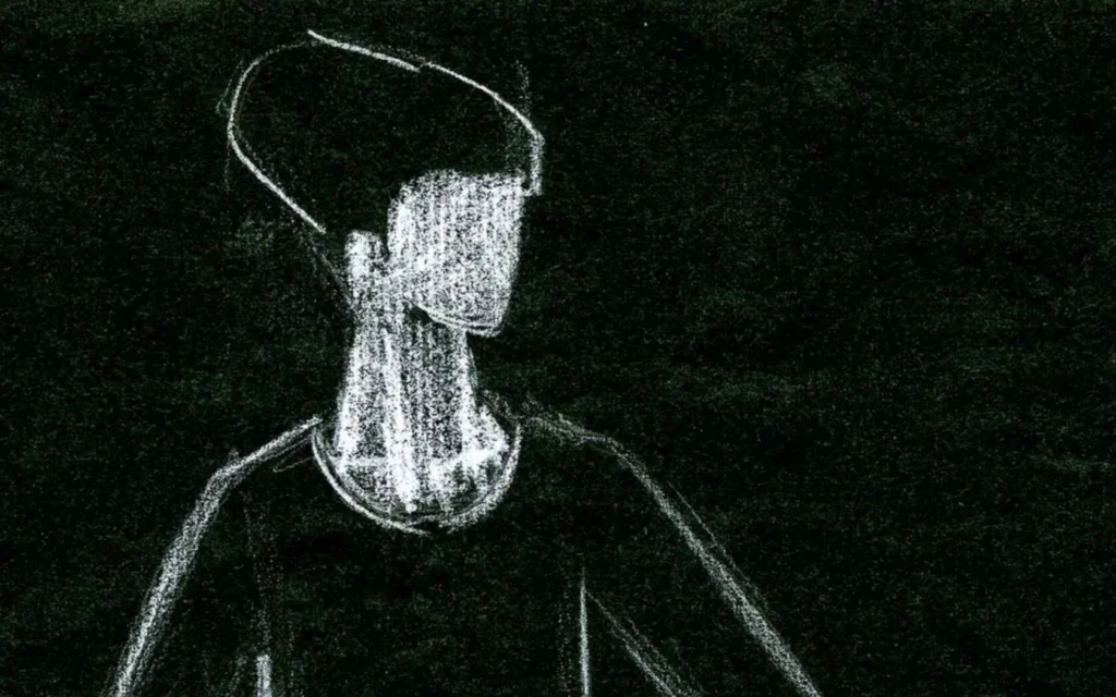A white chalk sketch of a faceless person with short hair, drawn on a black background. The figure appears to be wearing a shirt and is shown from the shoulders up, looking slightly to the side.