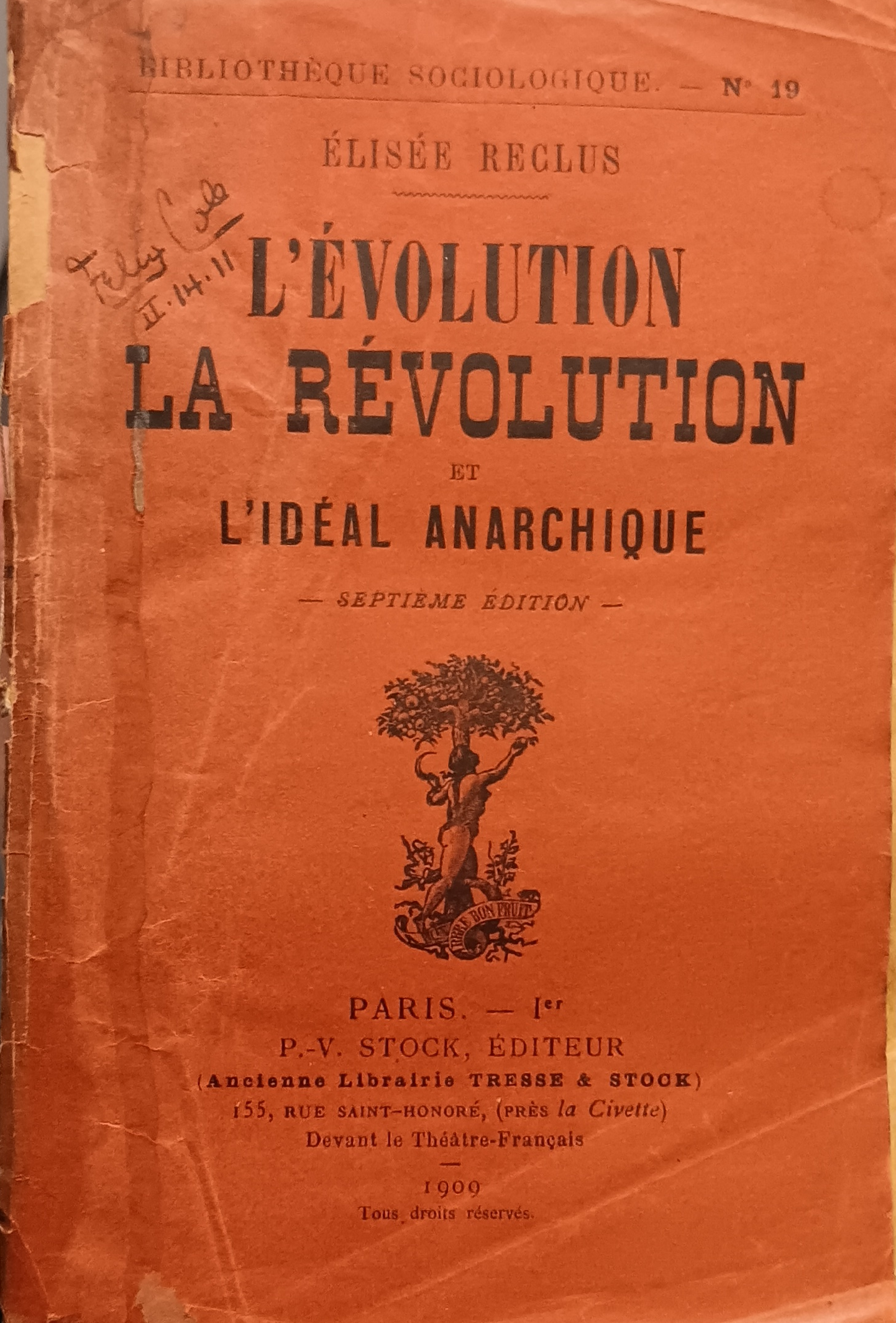Worn orange cover of “L’Évolution, La Révolution et L’Idéal Anarchique” by Élisée Reclus, seventh edition, published in Paris in 1902. French text and handwritten notes are visible on the upper left.