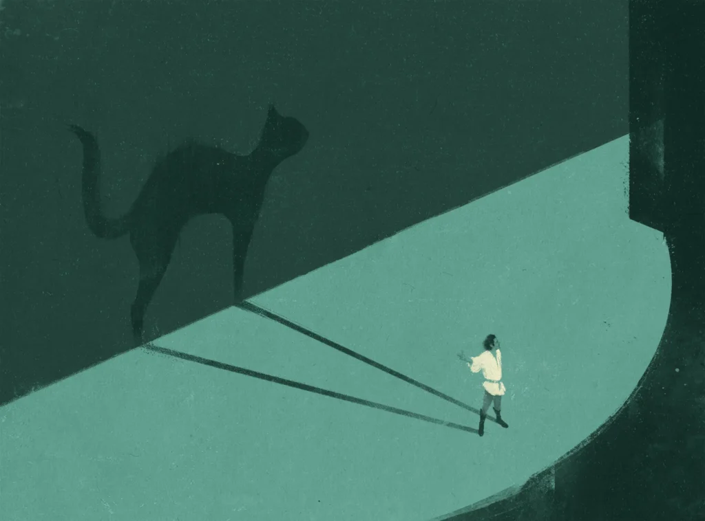 A person walks on a sidewalk, casting a shadow that morphs into a large cat shape on a dark wall. The scene is abstract, with contrasting light and dark green tones.