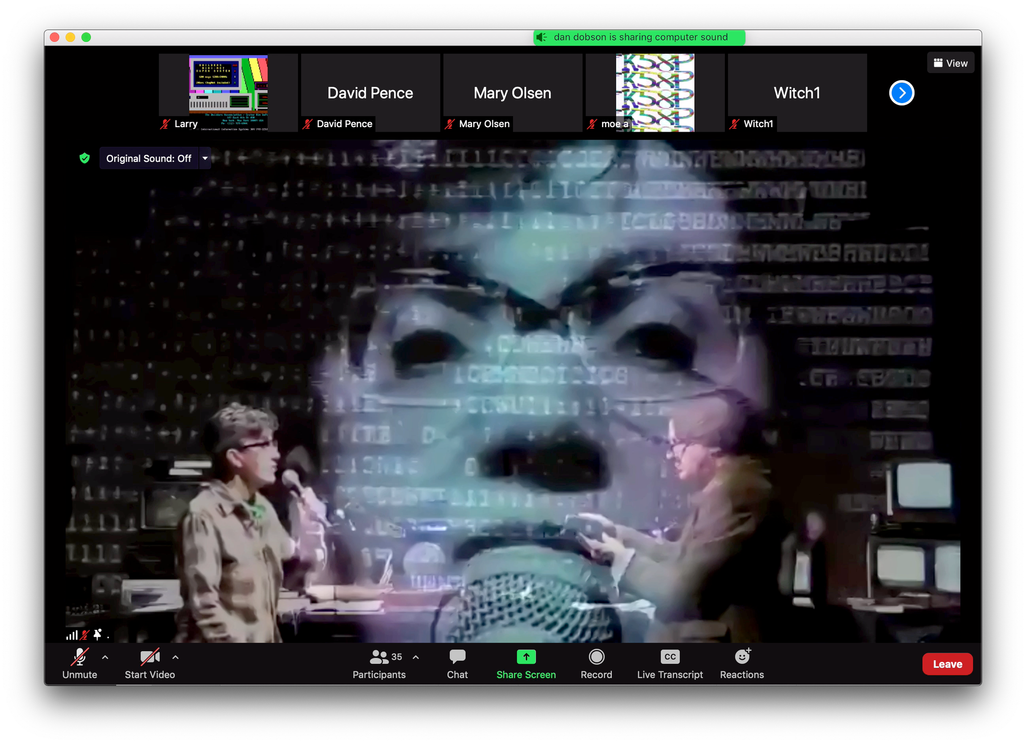 A Zoom call shows three participants and a screen share of a digital art scene with two people speaking and a large, pixelated face with code projected in the background.