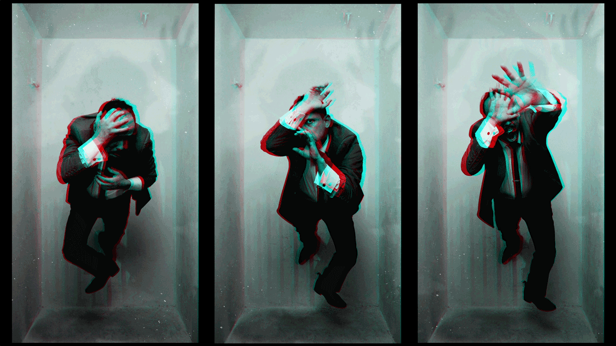 A man in a suit appears trapped in a small, vertical box in three panels, each showing him in distress, reaching and covering his face. The image has a glitchy, 3D effect.