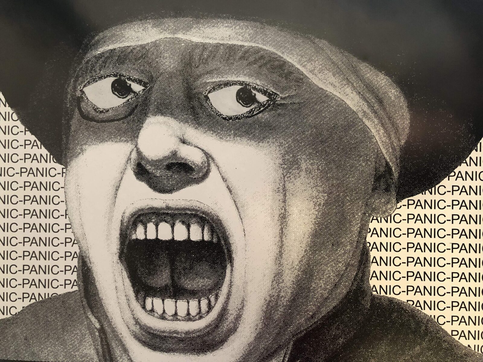 A black and white drawing of a person in a hat screaming, with wide eyes and an open mouth. The background repeats the word “PANIC” in all caps.