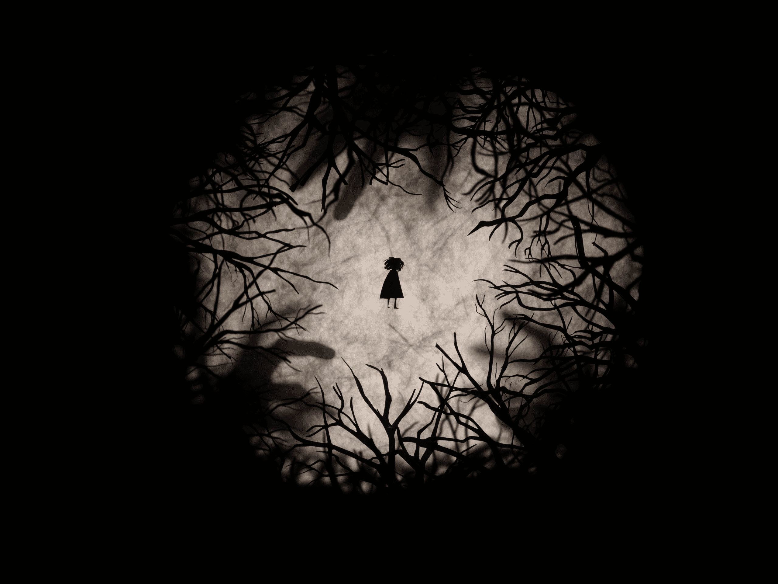 A silhouette of a small girl stands alone, surrounded by dark, twisted tree branches that form a circular frame, creating a sense of isolation and eeriness.