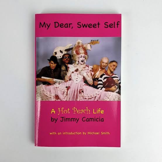 Book cover of “My Dear, Sweet Self: A Hot Peach Life” by Jimmy Camicia, featuring a group in colorful costumes and wigs against a pink background. Introduction by Michael Smith is noted at the bottom.