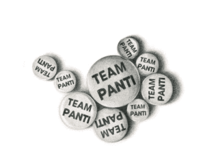 A cluster of white buttons with “TEAM PANTI” printed in bold black letters, arranged in various orientations on a white background.